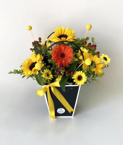 Bolsito Alegra. Girasoles y gerberas